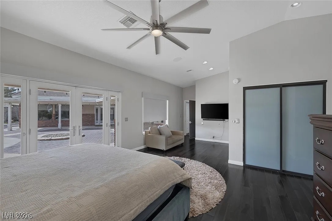 9 Quail Run Road Henderson, NV 89014 - Photo 25 of 57 Unwind in this private sanctuary, boasting elegant dark hardwood flooring and direct patio access.
