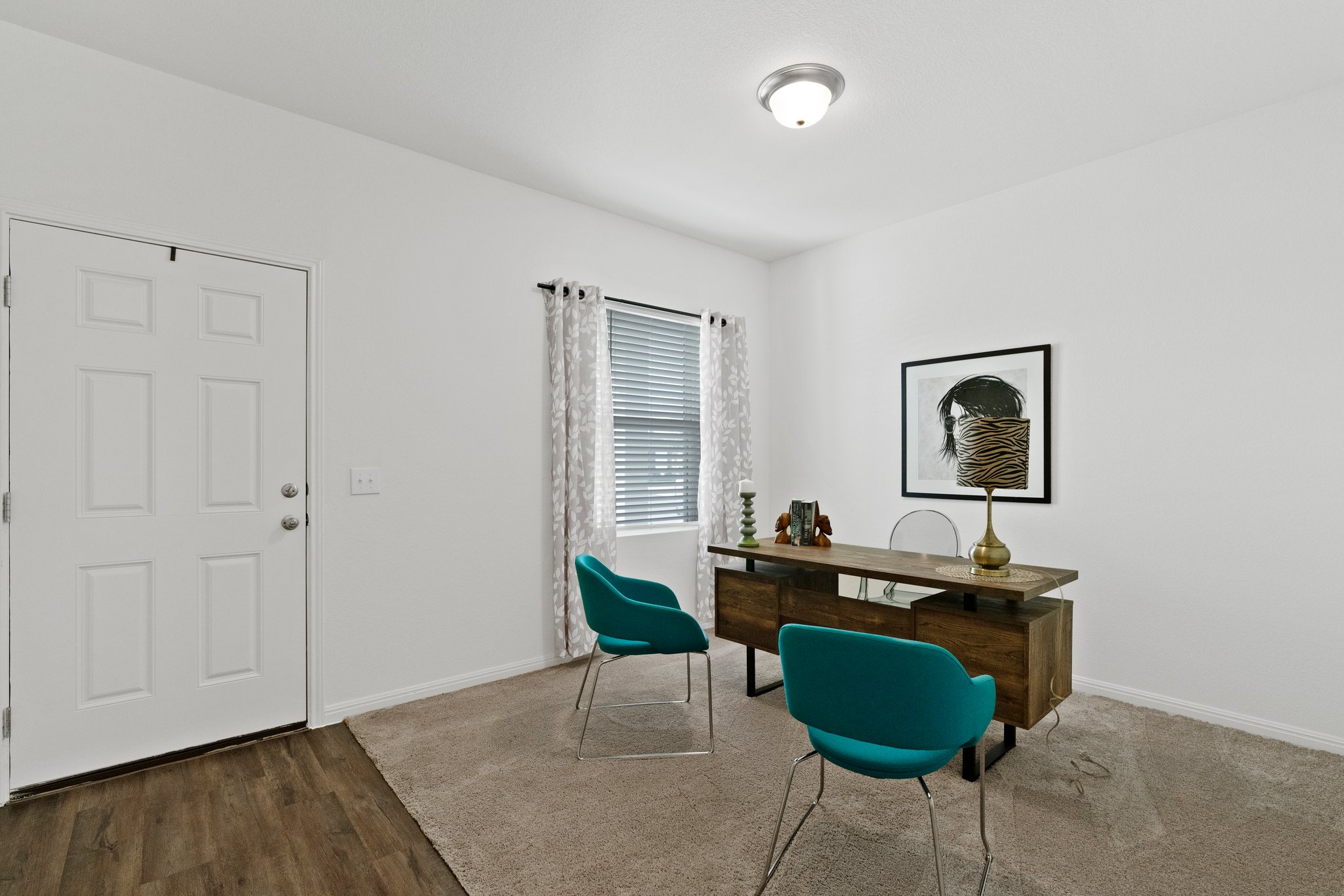 550 Bunton Reserve Boulevard Kyle, TX 78640 - Photo 12 of 32 A flex room is located off the foyer and is ideal for a home office, formal dining room, or additional living area.