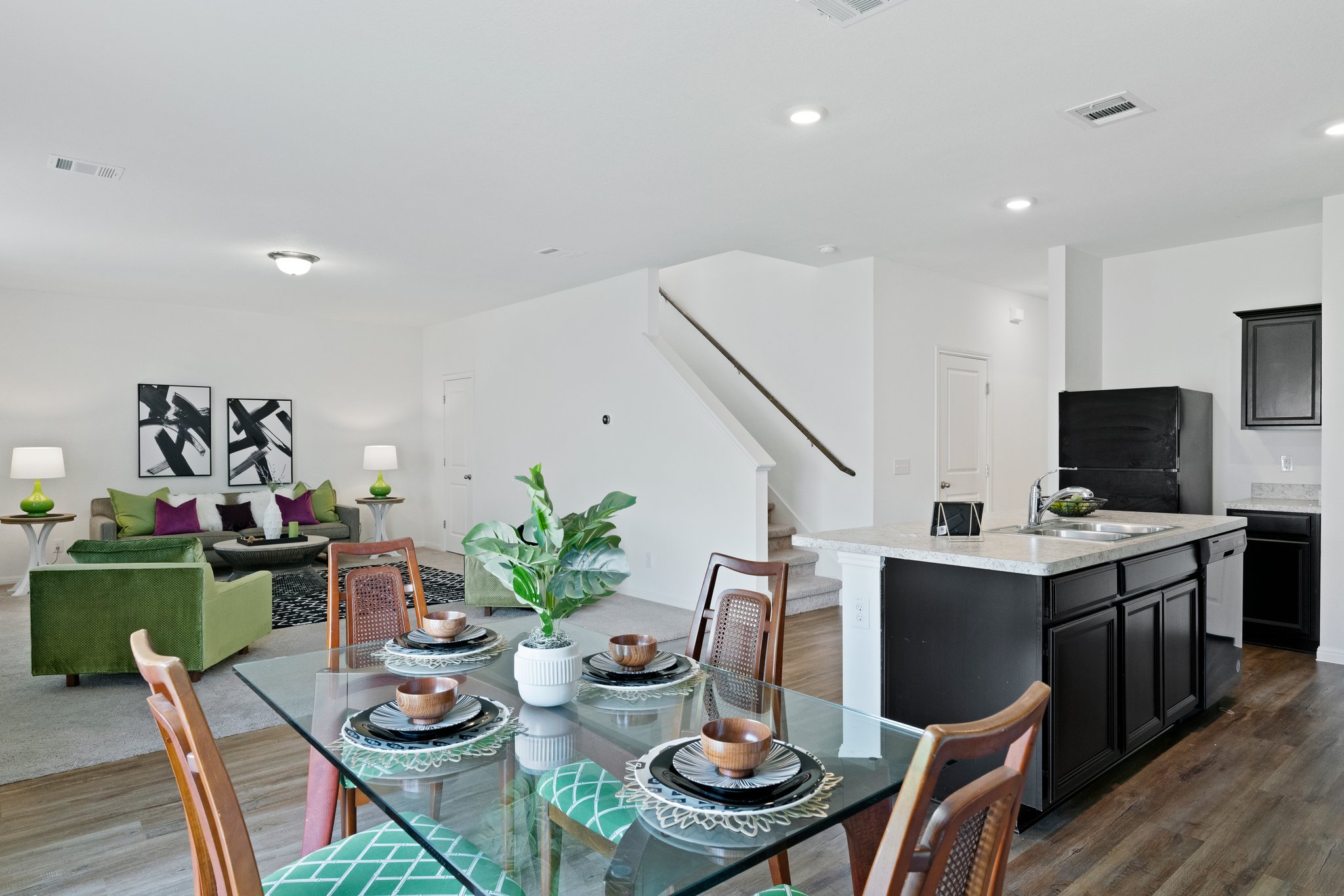 550 Bunton Reserve Boulevard Kyle, TX 78640 - Photo 17 of 32 The dining area sits conveniently adjacent to the kitchen for seamless gatherings.