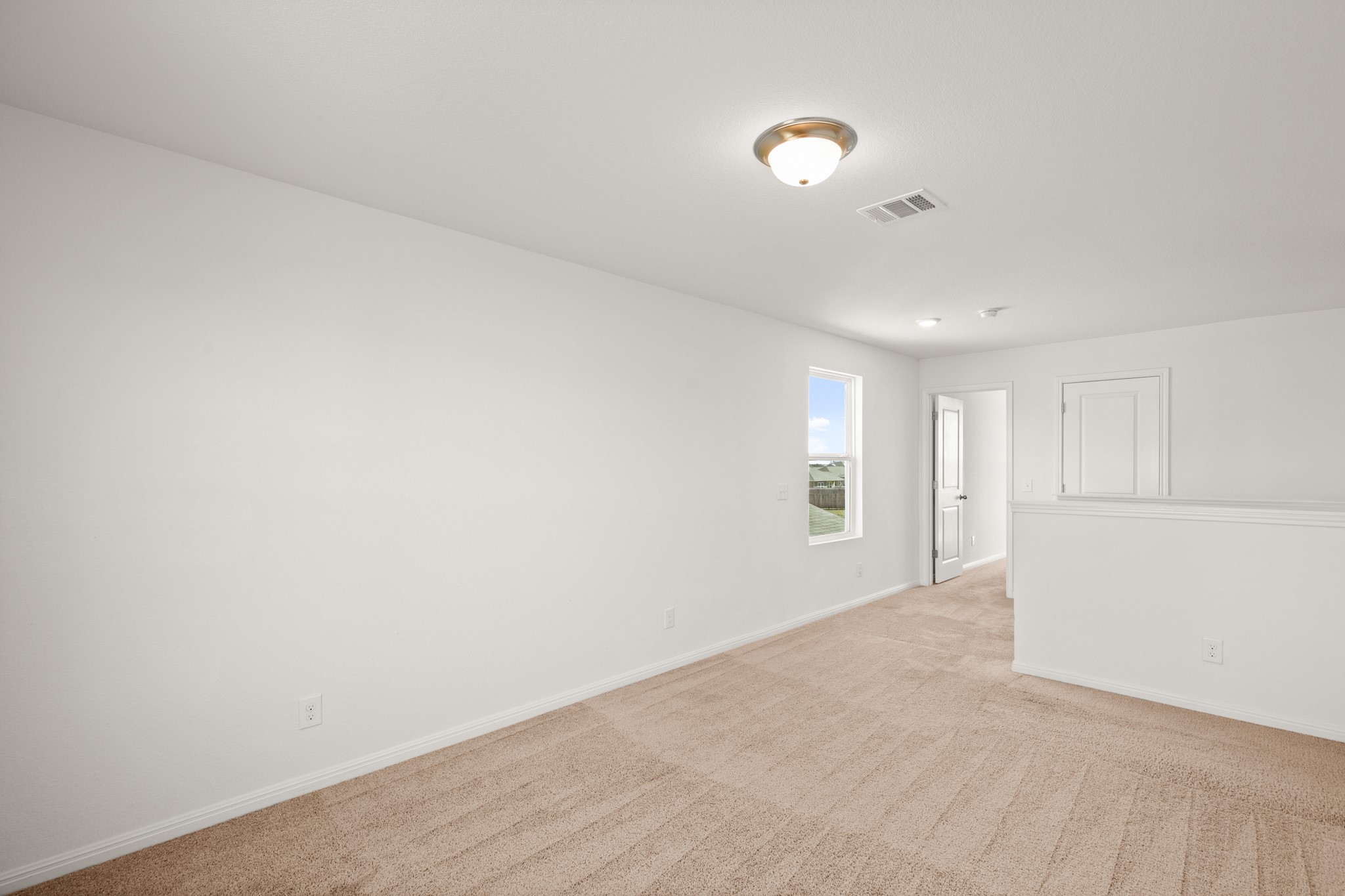 550 Bunton Reserve Boulevard Kyle, TX 78640 - Photo 24 of 32 This flexible area is ideal for movie nights, playtime, or a media lounge.