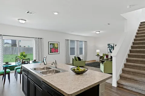 a bathroom with a sink and a yard