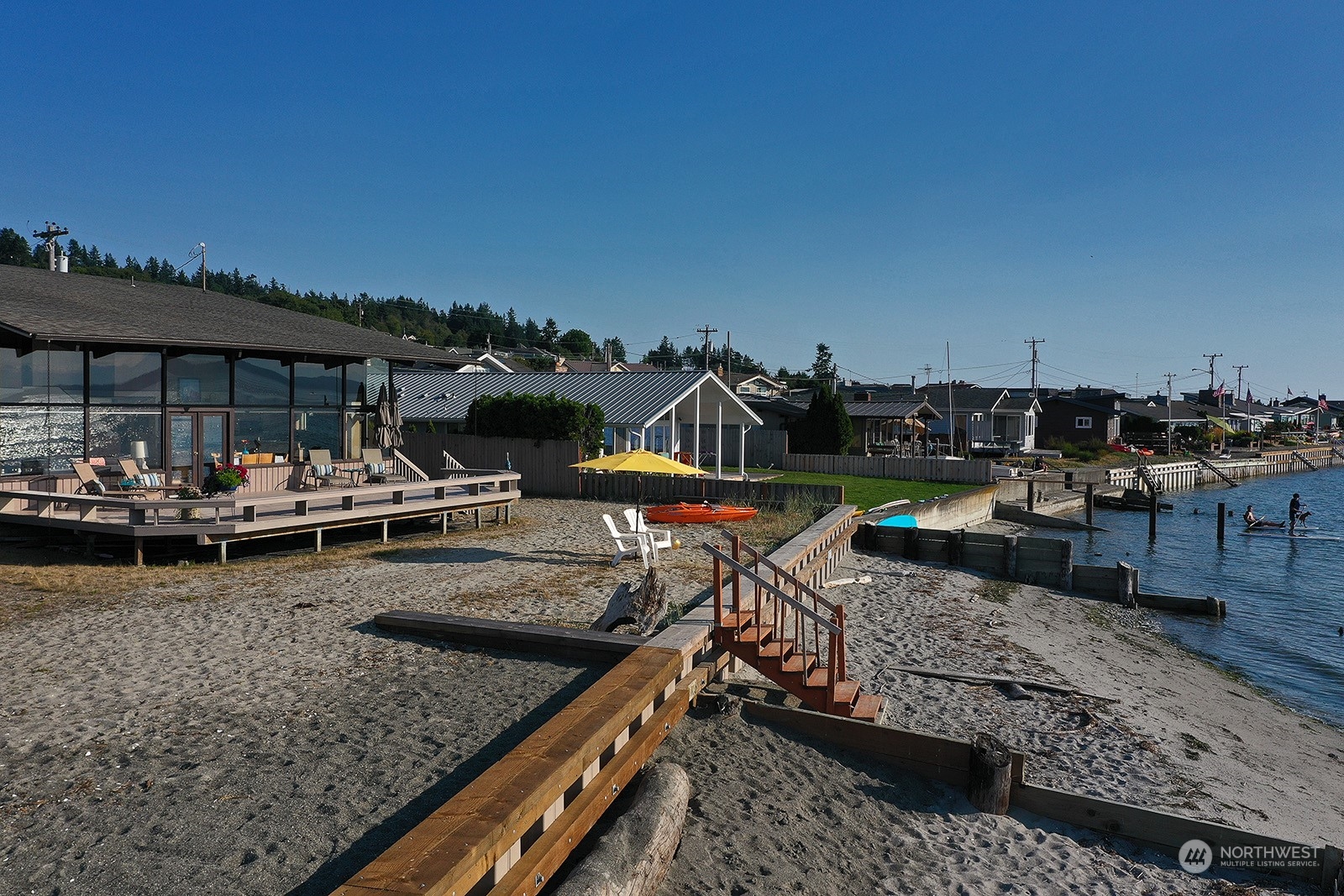 8166 Sandy Hook Drive Clinton, WA 98236 - Photo 3 of 40 a view of a backyard with sitting area
