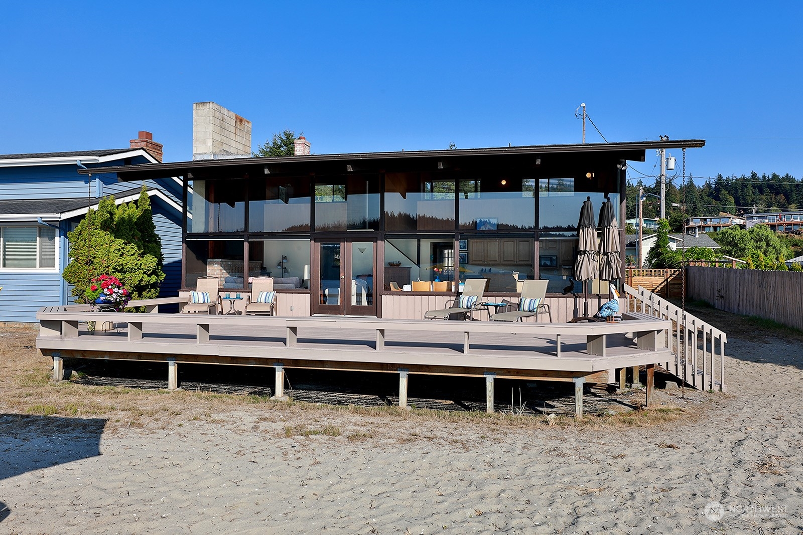 8166 Sandy Hook Drive Clinton, WA 98236 - Photo 35 of 40 a view of table and chairs in patio