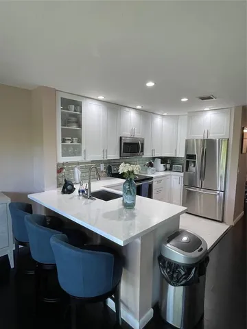 $429,000 | 10178 Royal Palm Boulevard, Unit 10178, Coral Springs, FL 33065