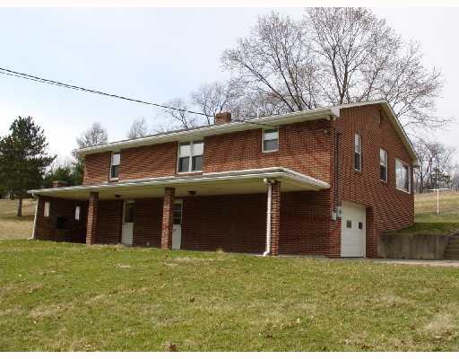 55 Pine Valley Road Washington, PA 15301 - Photo 1 of 8 Exterior Front. Main house is an all brick raised ranch with 3 bedrooms & 1.5 baths, eat-in kitchen, finished game room with fireplace & 2 car garage.