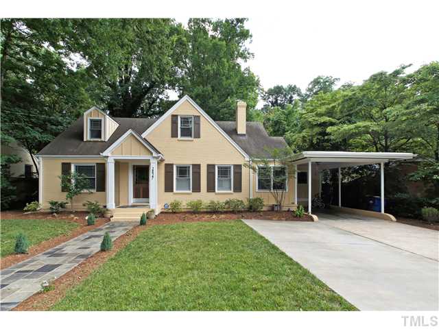 2827 Mayview Road Raleigh, NC 27607 - Photo 1 of 24 a front view of a house with a yard and trees