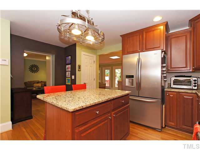 2827 Mayview Road Raleigh, NC 27607 - Photo 8 of 24 a kitchen with stainless steel appliances granite countertop a refrigerator a oven and a sink