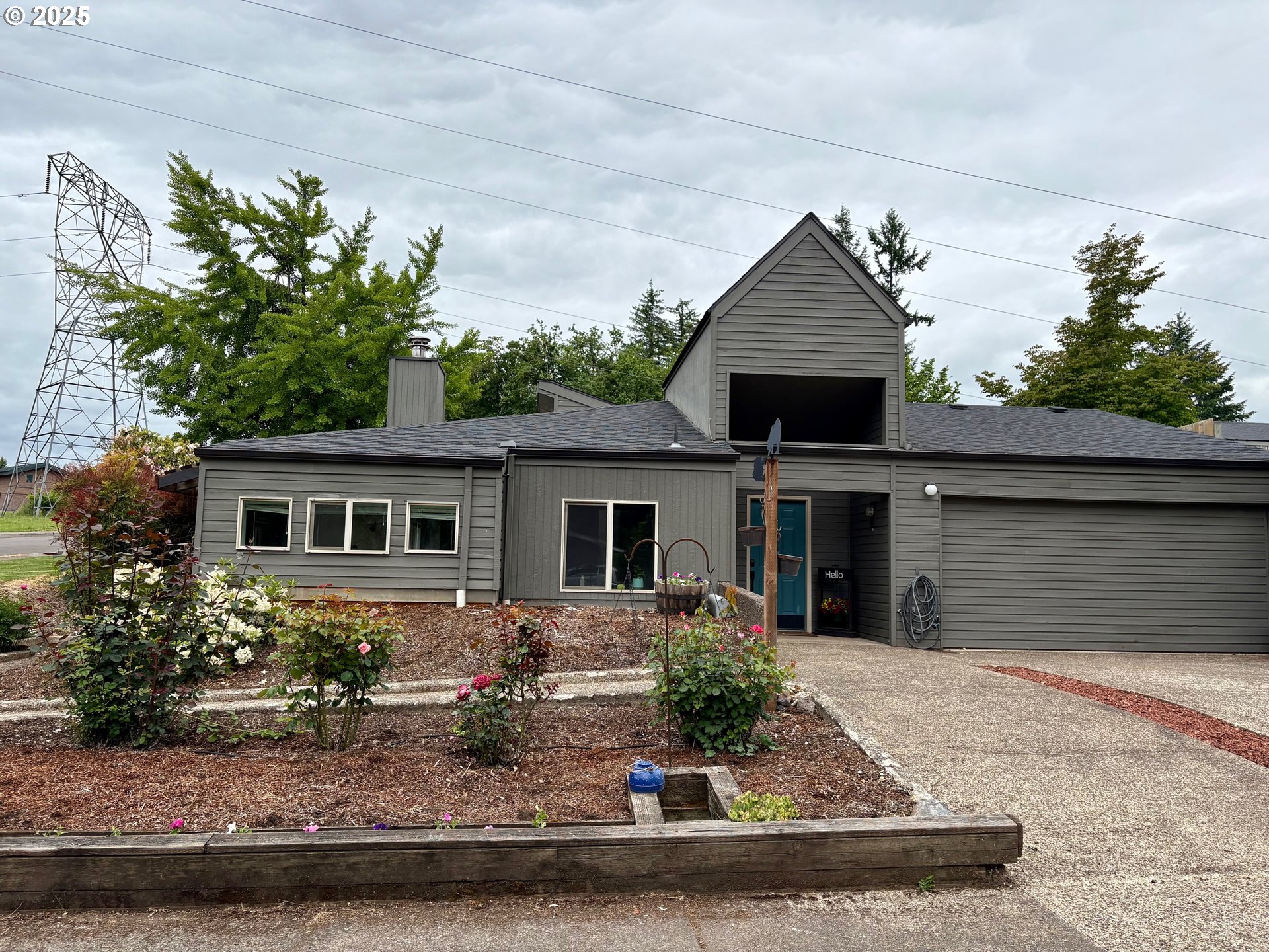 892 South 55th Place Springfield, OR 97478 - Photo 5 of 35 a front view of house with yard outdoor seating and barbeque oven