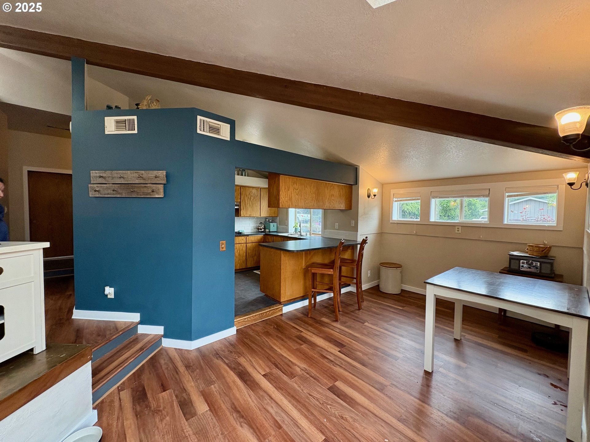 892 South 55th Place Springfield, OR 97478 - Photo 8 of 35 a room with furniture and a wooden floor