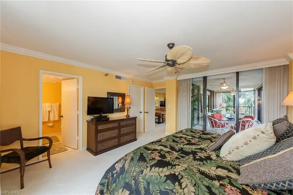 a bedroom with a bed and furniture