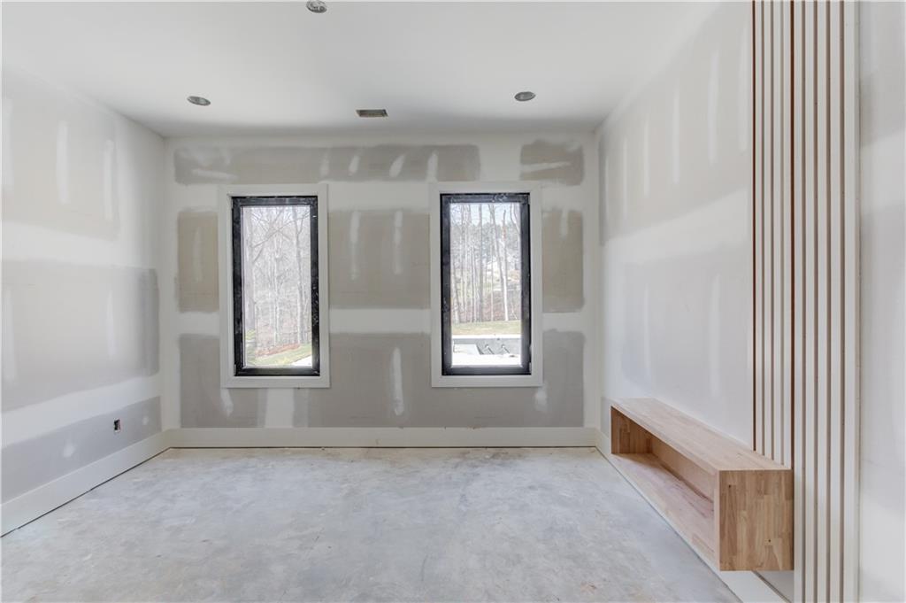 806 Riverside Road Sugar Hill, GA 30518 - Photo 12 of 40 a view of an empty room with a window