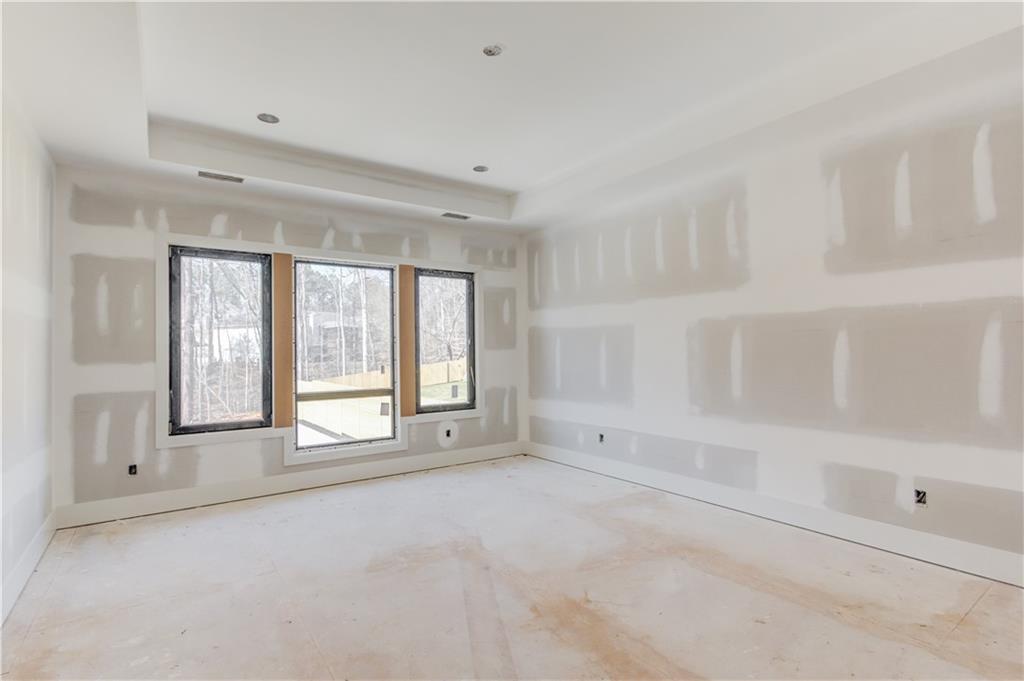 806 Riverside Road Sugar Hill, GA 30518 - Photo 25 of 40 a view of an empty room with a window