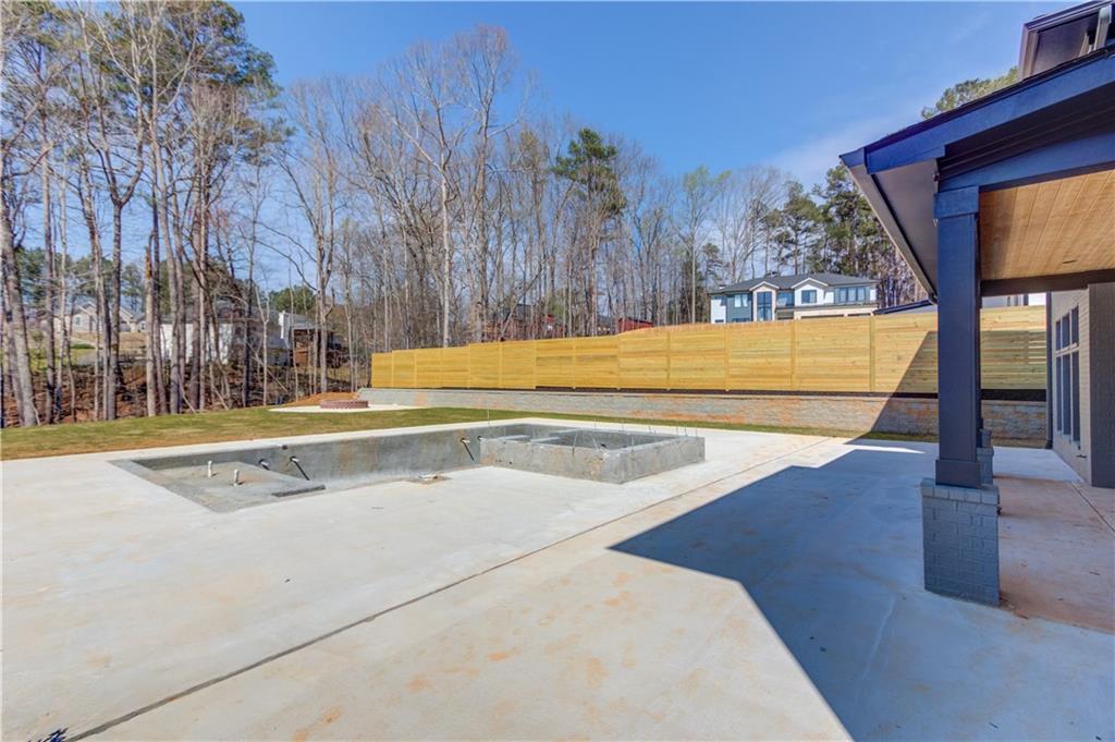 806 Riverside Road Sugar Hill, GA 30518 - Photo 34 of 40 a view of swimming pool with seating space