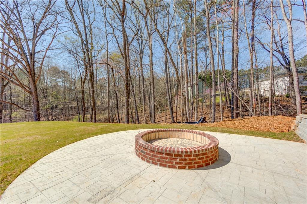 806 Riverside Road Sugar Hill, GA 30518 - Photo 38 of 40 a view of a tub with a trees