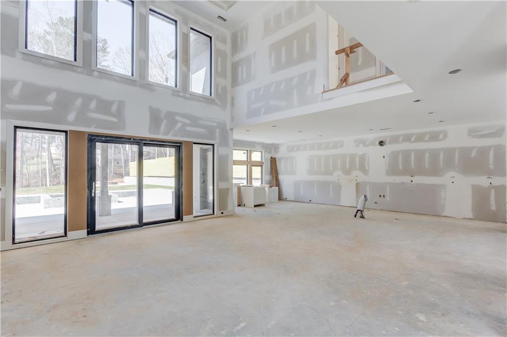 806 Riverside Road Sugar Hill, GA 30518 - Photo 5 of 40 a view of an empty room with a window