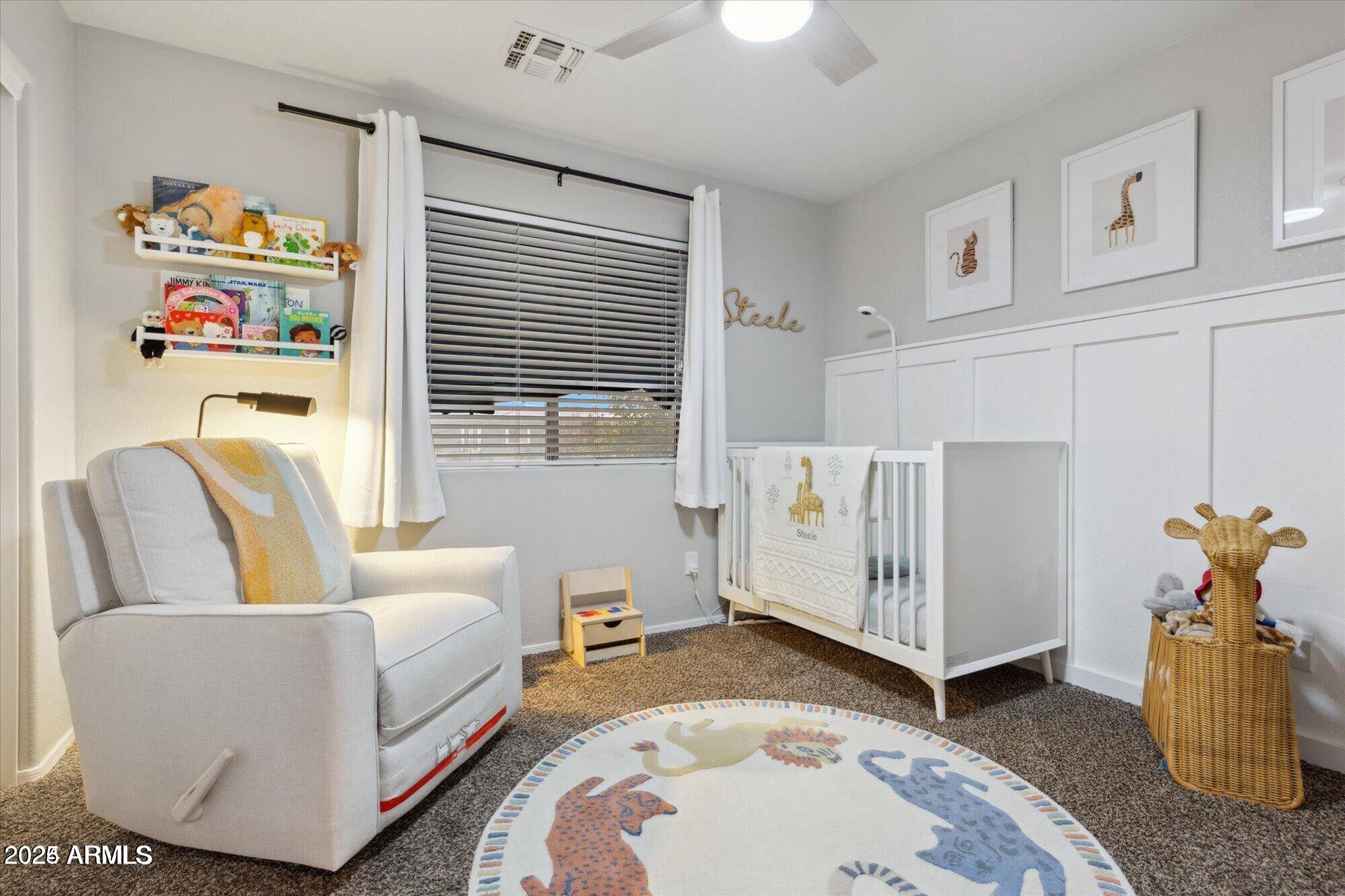 5210 North 16th Drive Phoenix, AZ 85015 - Photo 16 of 26 a living room with furniture and a window