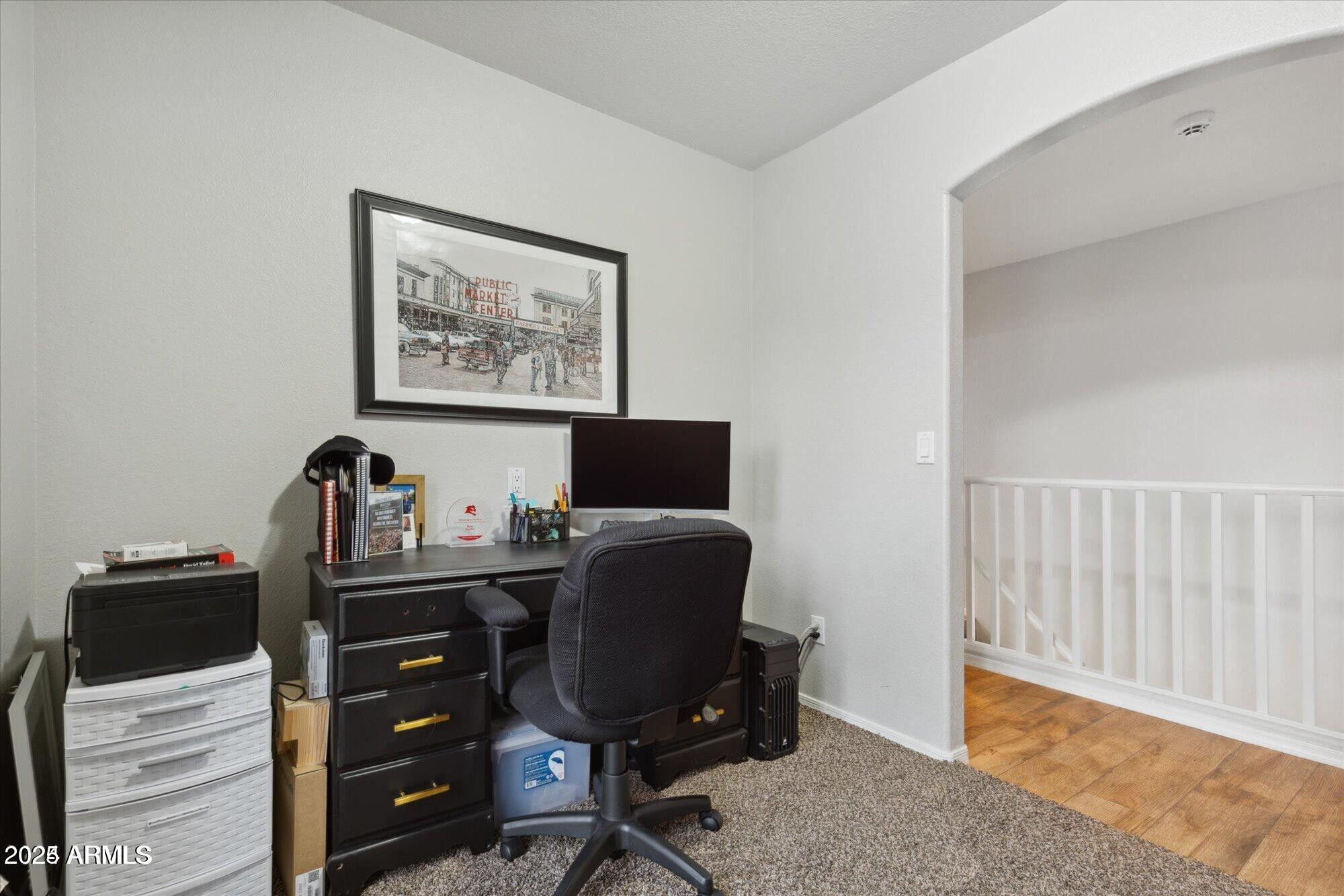 5210 North 16th Drive Phoenix, AZ 85015 - Photo 19 of 26 a view of workspace with wooden floor