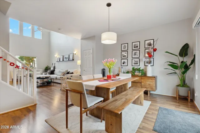 a view of a livingroom with furniture and a table