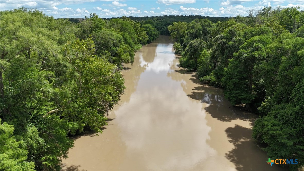 340 Cypress Valley Road Cuero, TX 77954 - Photo 18 of 23 a view of a lake with outside space