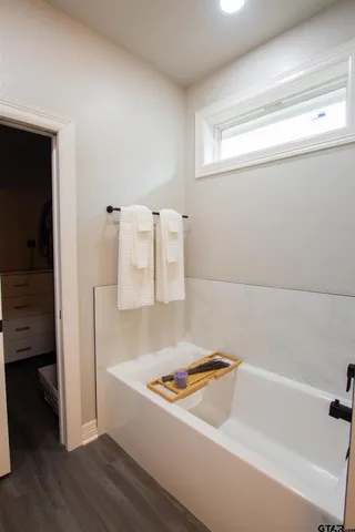 a bathroom with a tub