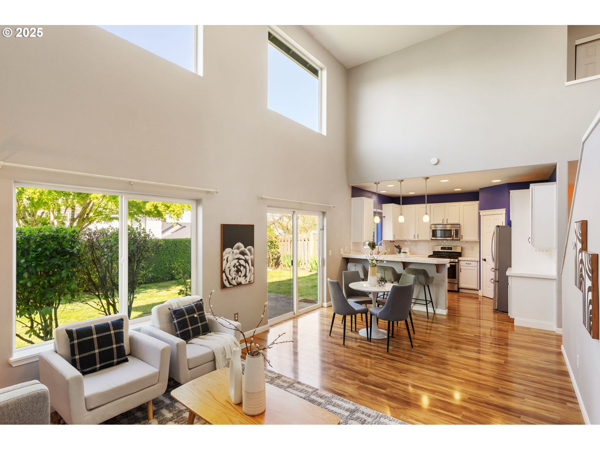 6379 Southeast 31st Terrace Gresham, OR 97080 - Photo 13 of 42 a living room with fireplace furniture and a large window