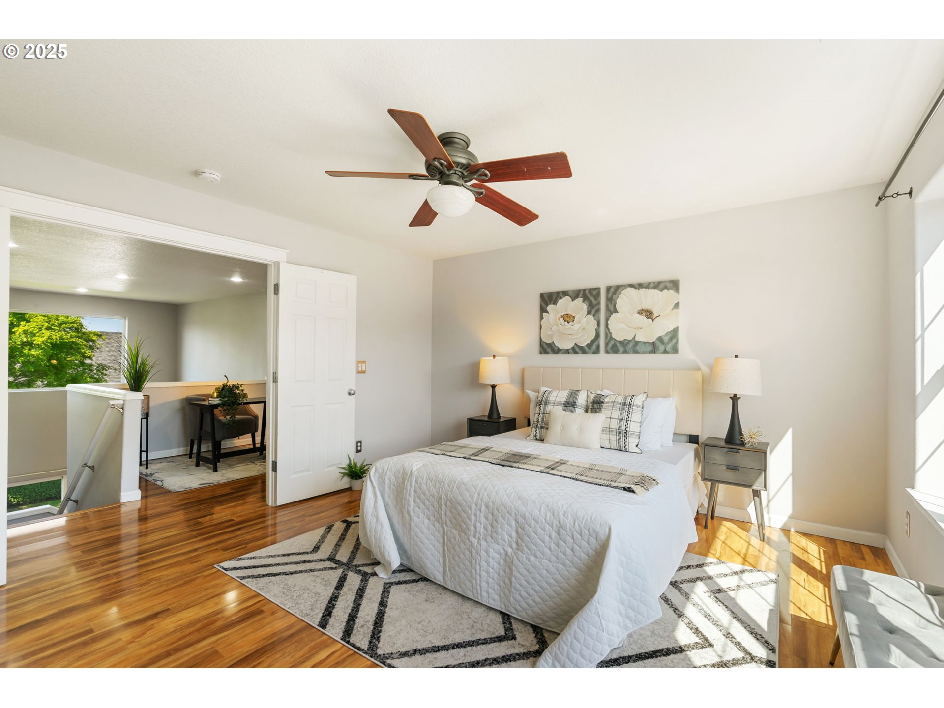 6379 Southeast 31st Terrace Gresham, OR 97080 - Photo 21 of 42 a bedroom with a bed and wooden floor