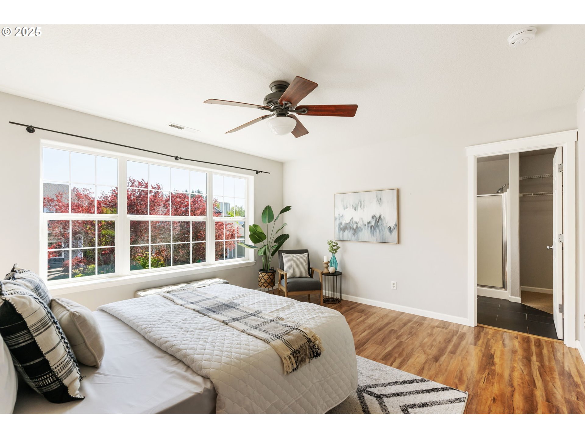 6379 Southeast 31st Terrace Gresham, OR 97080 - Photo 22 of 42 a bedroom with a bed and a large window
