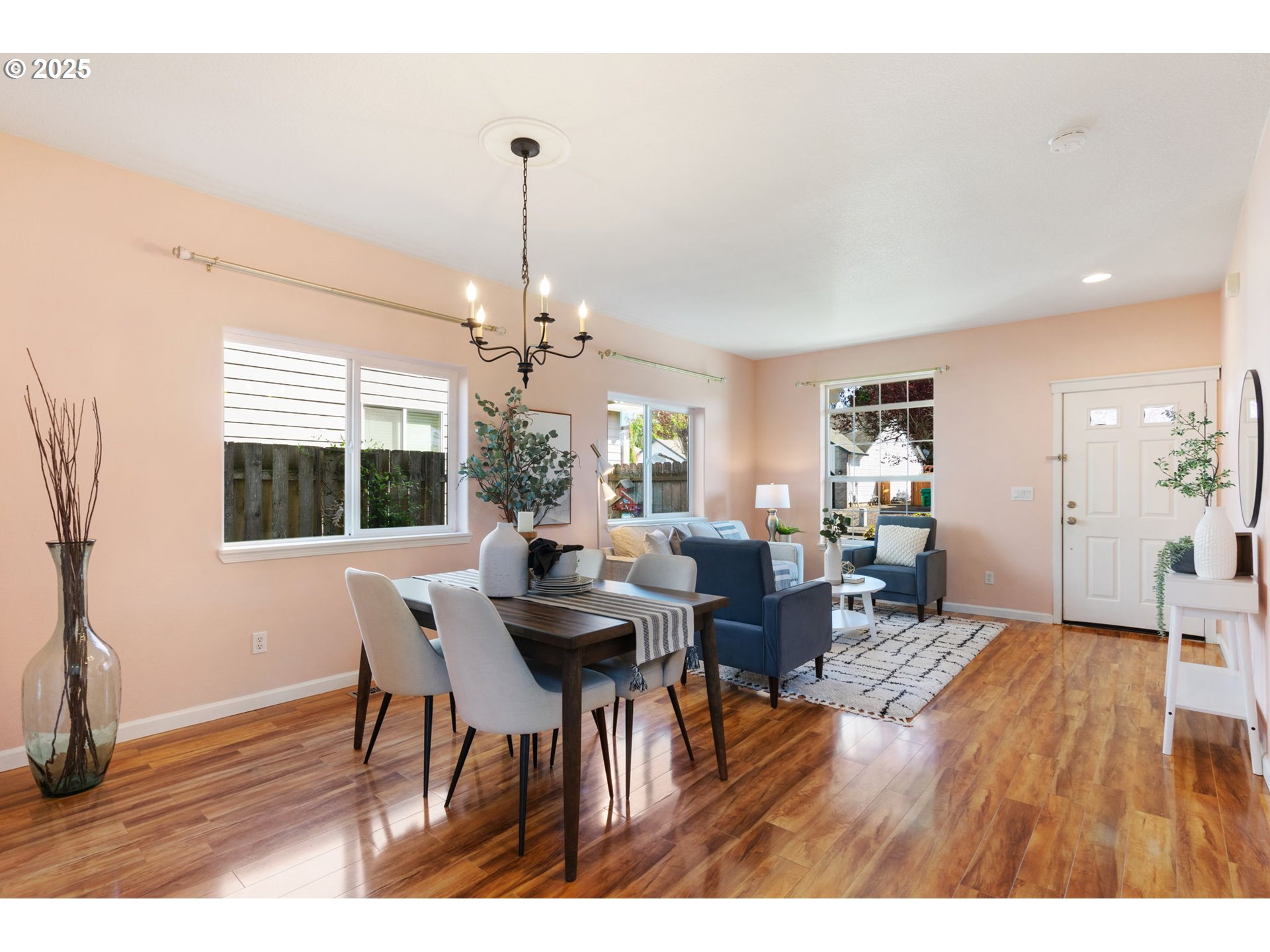 6379 Southeast 31st Terrace Gresham, OR 97080 - Photo 4 of 42 a view of a dining room with furniture window and wooden floor