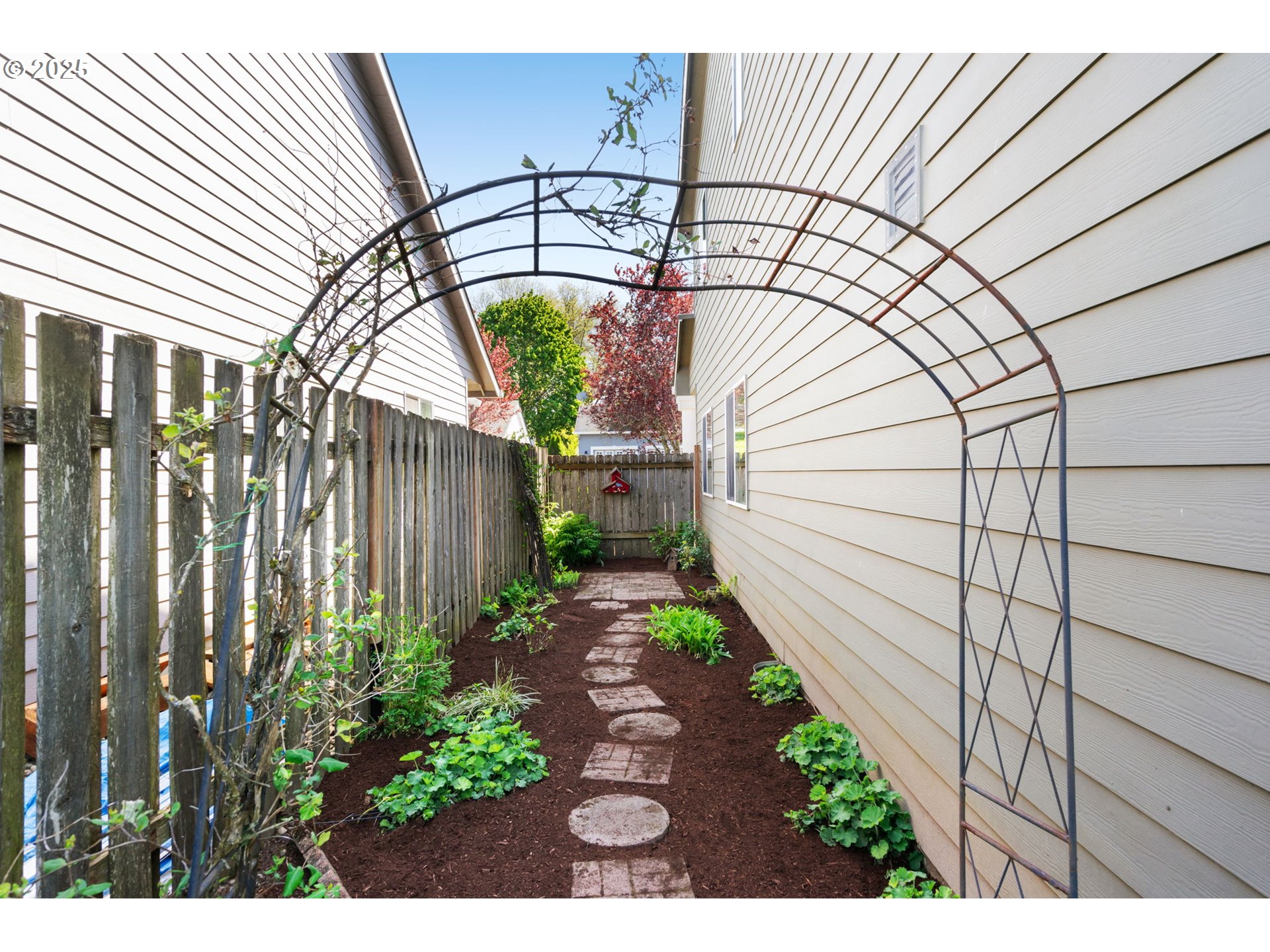 6379 Southeast 31st Terrace Gresham, OR 97080 - Photo 42 of 42 a backyard of a house with lots of green space