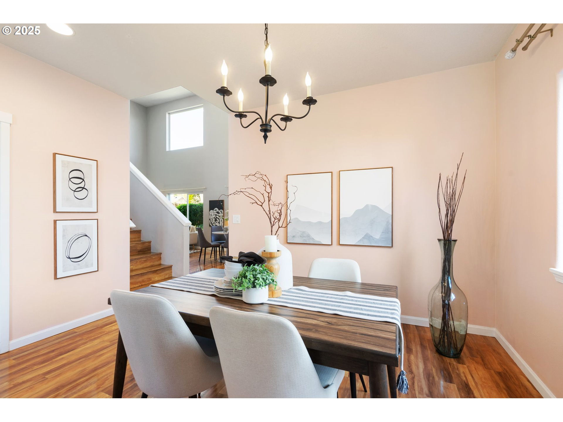 6379 Southeast 31st Terrace Gresham, OR 97080 - Photo 6 of 42 a living room with furniture a chandelier and a dining table