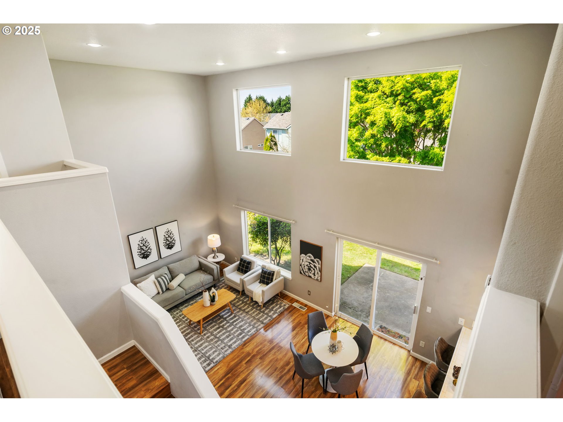 6379 Southeast 31st Terrace Gresham, OR 97080 - Photo 7 of 42 a view of living room with furniture and a floor to ceiling window