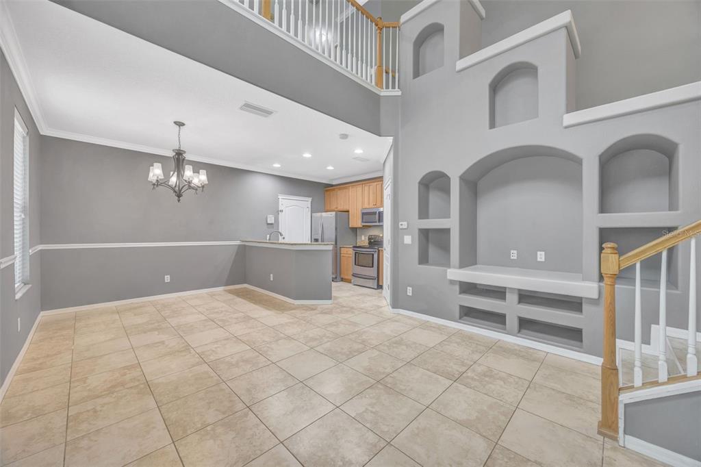 6020 Fishhawk Crossing Boulevard Lithia, FL 33547 - Photo 2 of 68 a large white kitchen with cabinets