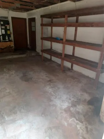 a view of backyard with tub and shower