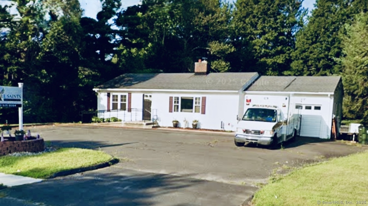 a car parked in front of a house