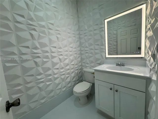 a car parked in front of a house