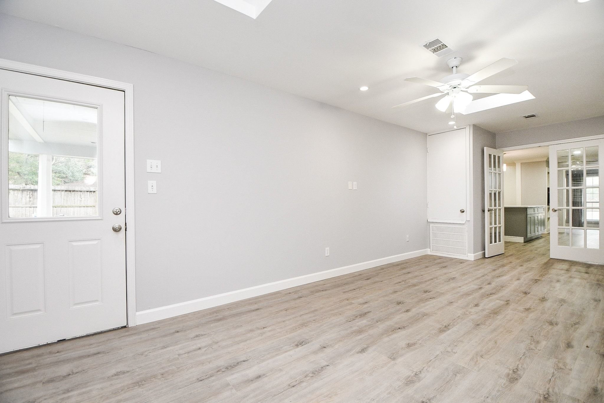 14011 Wickersham Lane Houston, TX 77077 - Photo 17 of 38 Located just off the kitchen, this incredible mudroom with exterior access offers exceptional organization and everyday functionality.