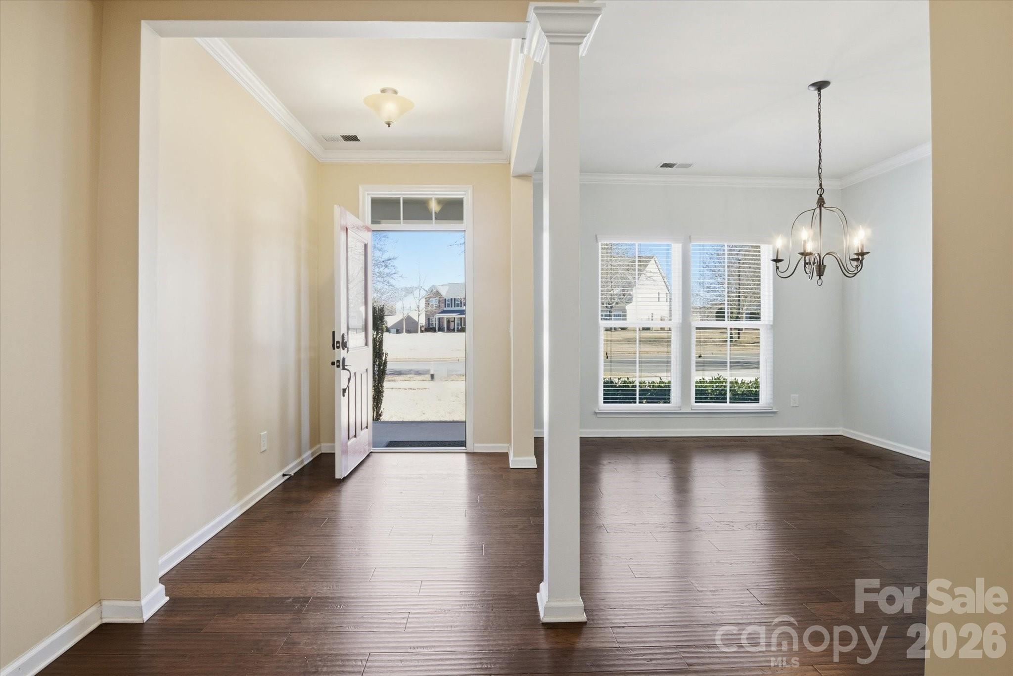 5009 St Clair Street Fort Mill, SC 29715 - Photo 12 of 40 a view of a room with wooden floor closet and windows