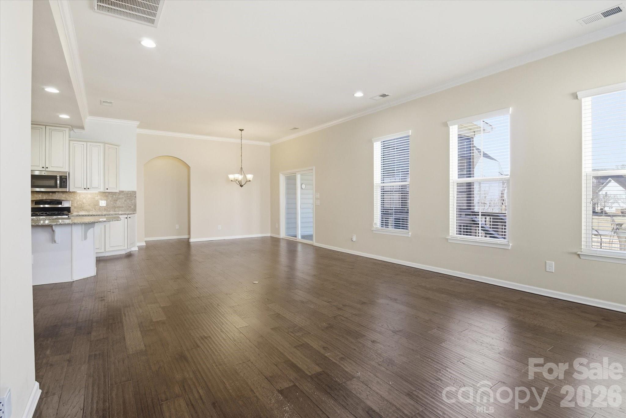 5009 St Clair Street Fort Mill, SC 29715 - Photo 20 of 40 a view of a kitchen with a sink and a stove top oven