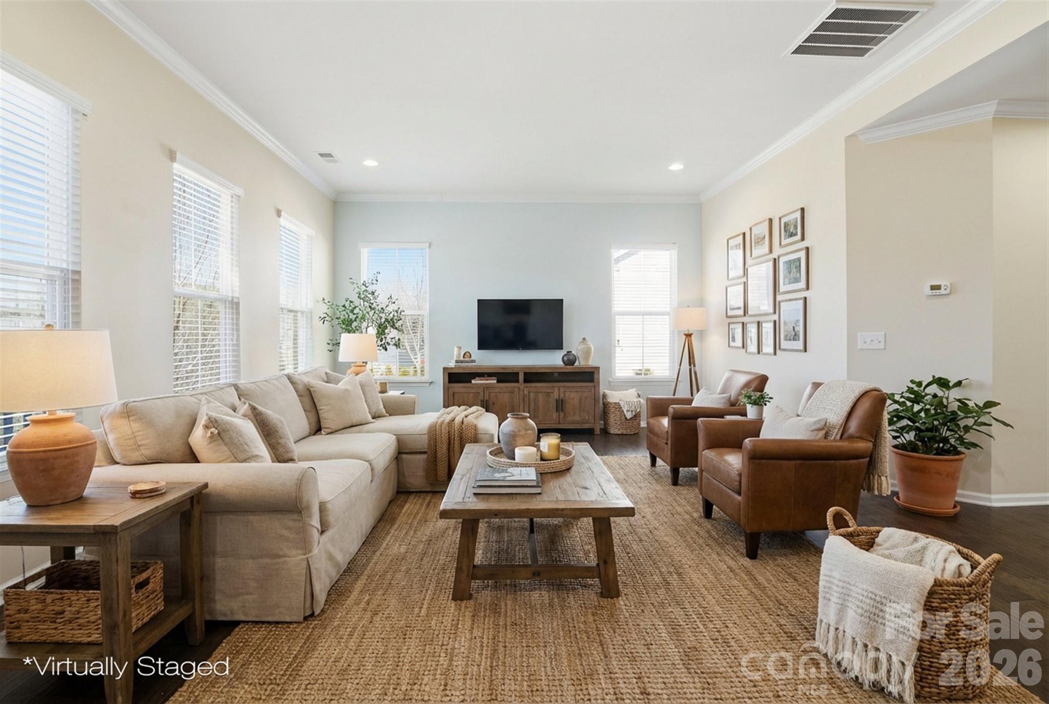5009 St Clair Street Fort Mill, SC 29715 - Photo 7 of 40 a living room with furniture and a flat screen tv