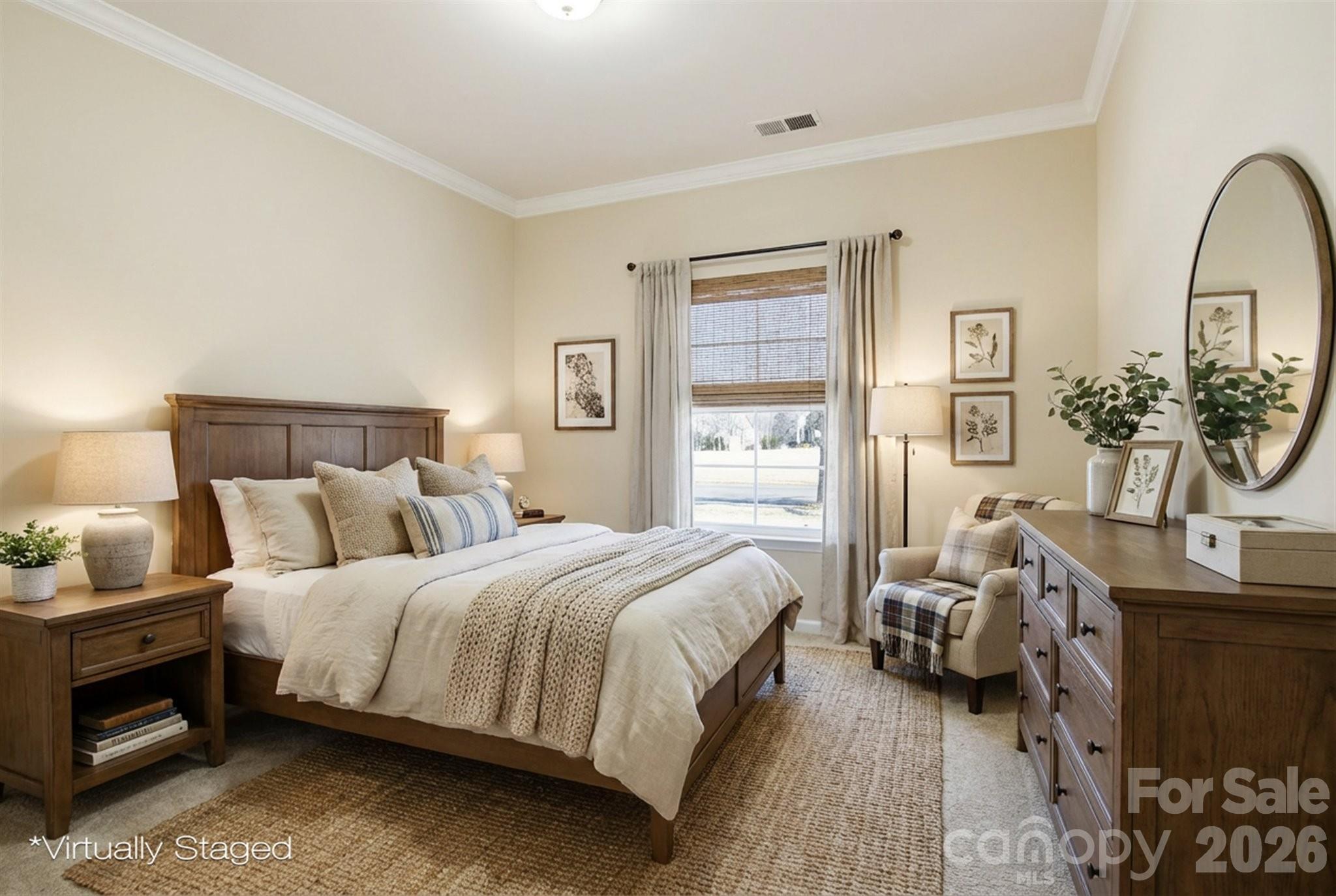 5009 St Clair Street Fort Mill, SC 29715 - Photo 9 of 40 a bedroom with a bed and a couch