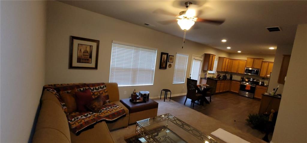 3433 Cascade Parc Boulevard Southwest Atlanta, GA 30311 - Photo 11 of 30 a living room with furniture