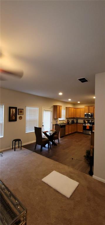 3433 Cascade Parc Boulevard Southwest Atlanta, GA 30311 - Photo 10 of 30 a living room with furniture and a large window