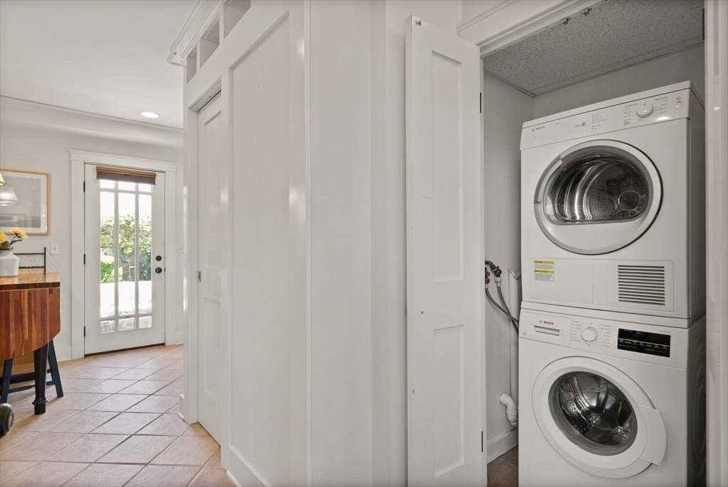 150 Prospect Street, Unit 3 Gloucester, MA 01930 - Photo 17 of 25 a view of a hallway with washer and dryer