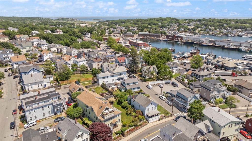 150 Prospect Street, Unit 3 Gloucester, MA 01930 - Photo 23 of 25 an aerial view of residential building and lake