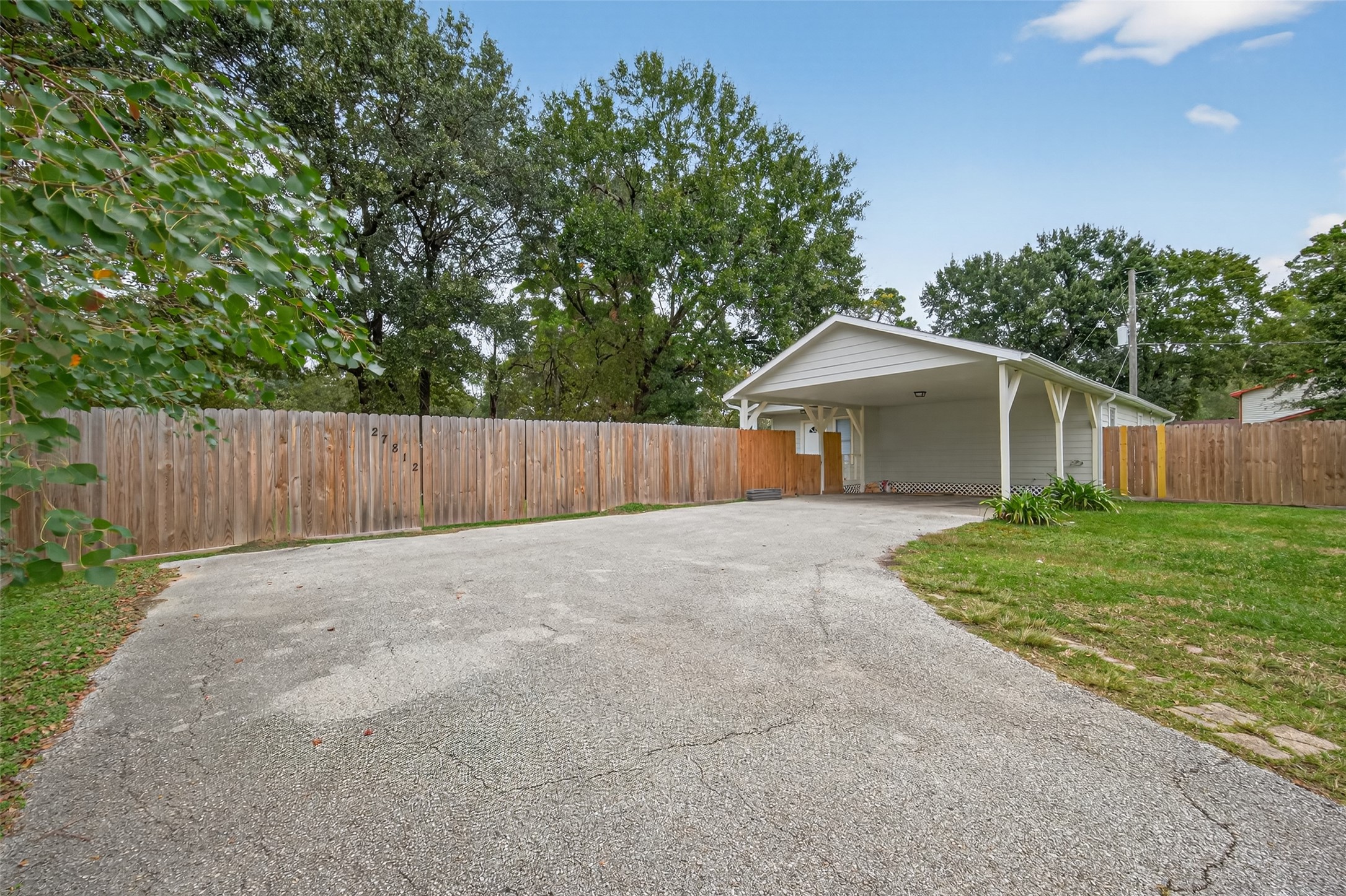 27812 Red Fox Road Tomball, TX 77377 - Photo 1 of 33 a backyard of a house with lots of green space