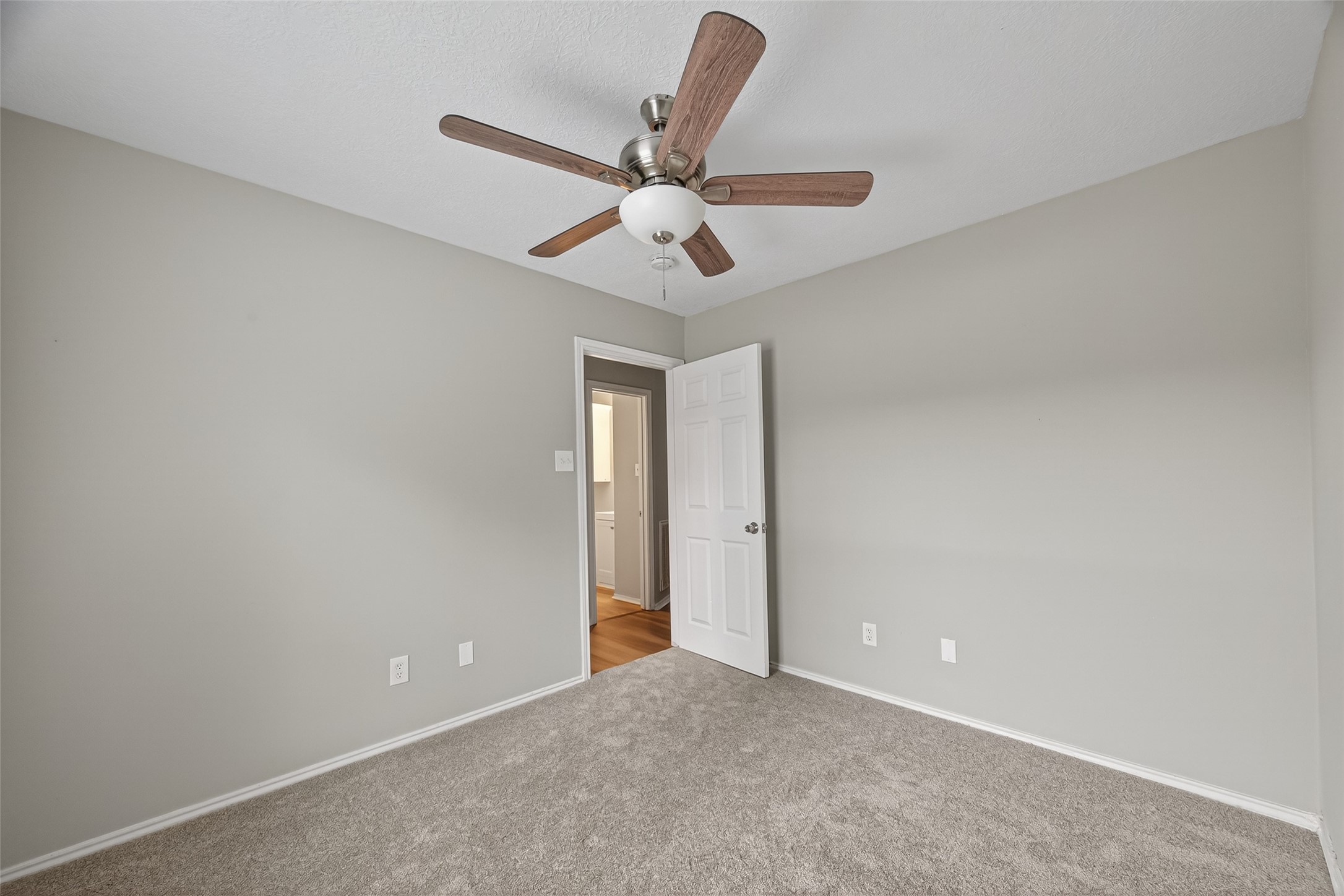 27812 Red Fox Road Tomball, TX 77377 - Photo 21 of 33 a view of an empty room and chandelier fan