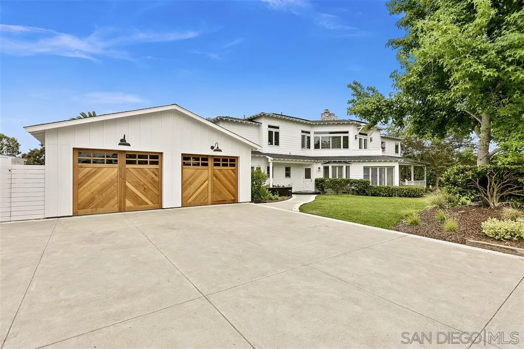 1441 Crest Drive Encinitas, CA 92024 - Photo 1 of 25 a front view of a house with a garden and yard