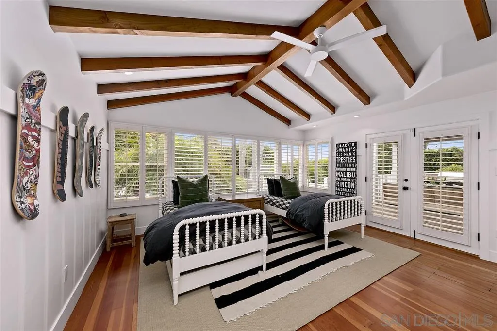 1441 Crest Drive Encinitas, CA 92024 - Photo 14 of 25 a bedroom with furniture and a large window