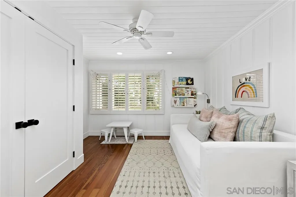 1441 Crest Drive Encinitas, CA 92024 - Photo 16 of 25 a living room with furniture and a large window