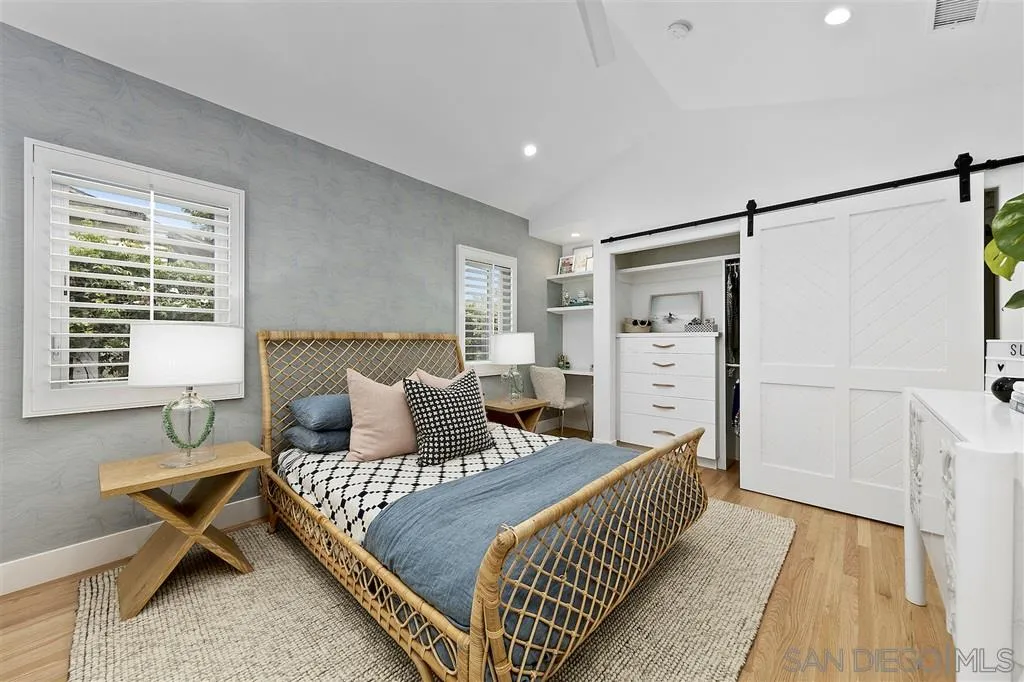 1441 Crest Drive Encinitas, CA 92024 - Photo 18 of 25 a bedroom with a bed and a window